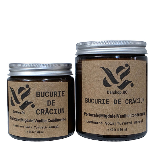 Lumânare Bucurie de Crăciun – portocală, cuișoare și vanilie, atmosferă festivă.